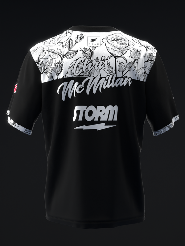 Black bowling jersey with white floral panel and text graphic front view