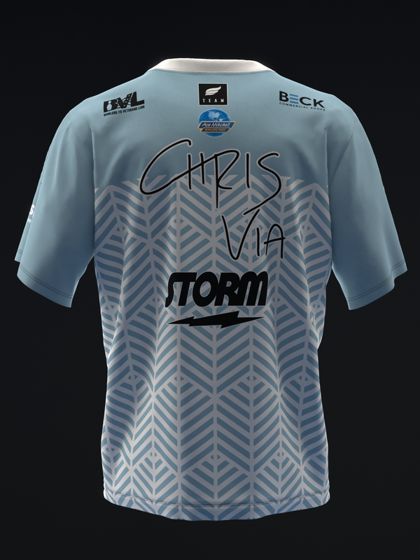 Light blue bowling jersey with geometric pattern and Storm branding, front view