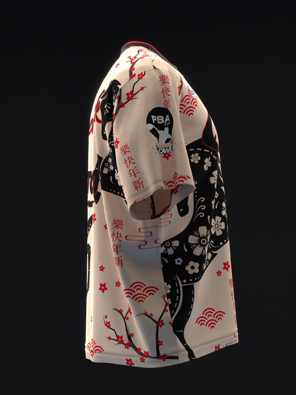 Cream bowling jersey with red and black Asian-inspired design, side view