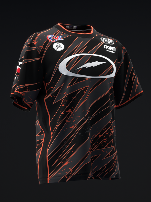 Black bowling jersey with orange streaked pattern and white logo on front