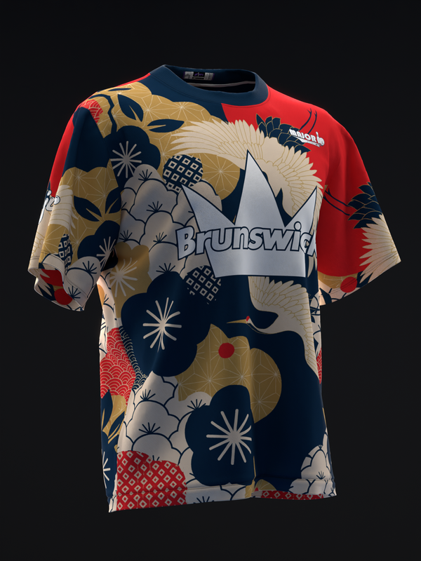 Front view of bowling jersey with red, navy, gold, and white floral crane pattern and Brunswick logo