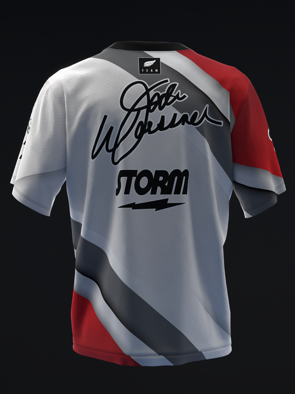 White bowling jersey with red and gray color blocks and Storm logo with signature