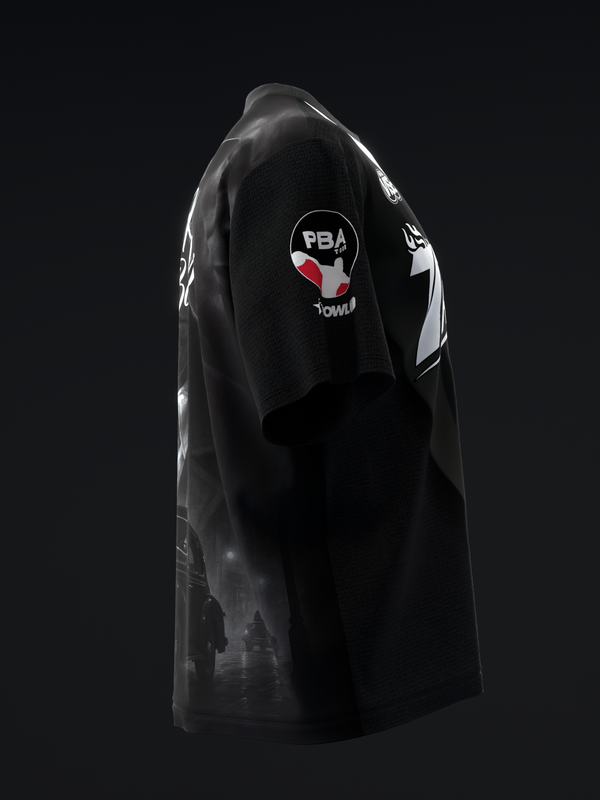 Black bowling jersey with PBA logo and graphic sleeve design, side view