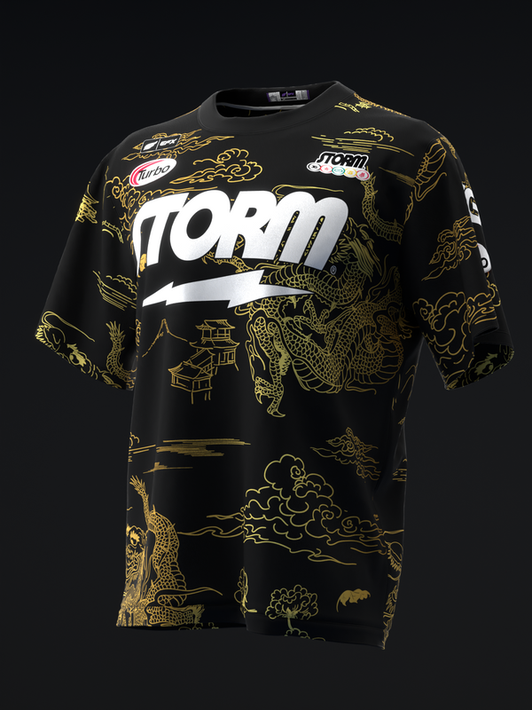 Black bowling jersey with large white Storm logo and gold Asian dragon motifs throughout