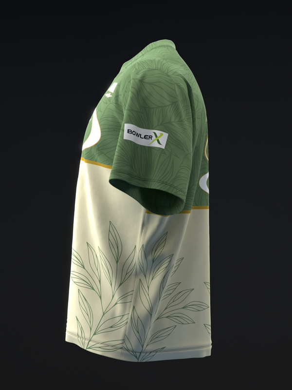 Sage green and cream bowling jersey with leaf graphic design, side view