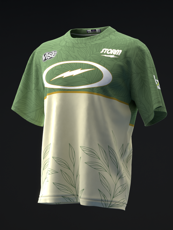 Green and cream bowling jersey with white oval logo and leaf pattern detail