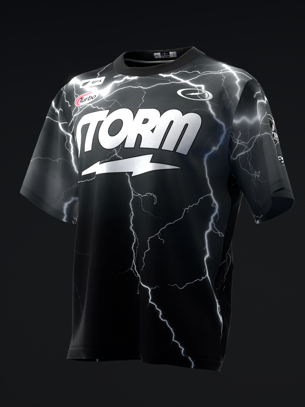 Black bowling jersey with white STORM logo and lightning bolt graphic pattern