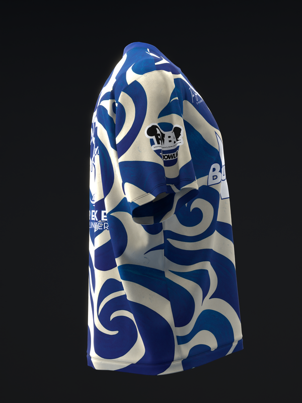 Blue and cream bowling jersey with ikat geometric pattern, side view