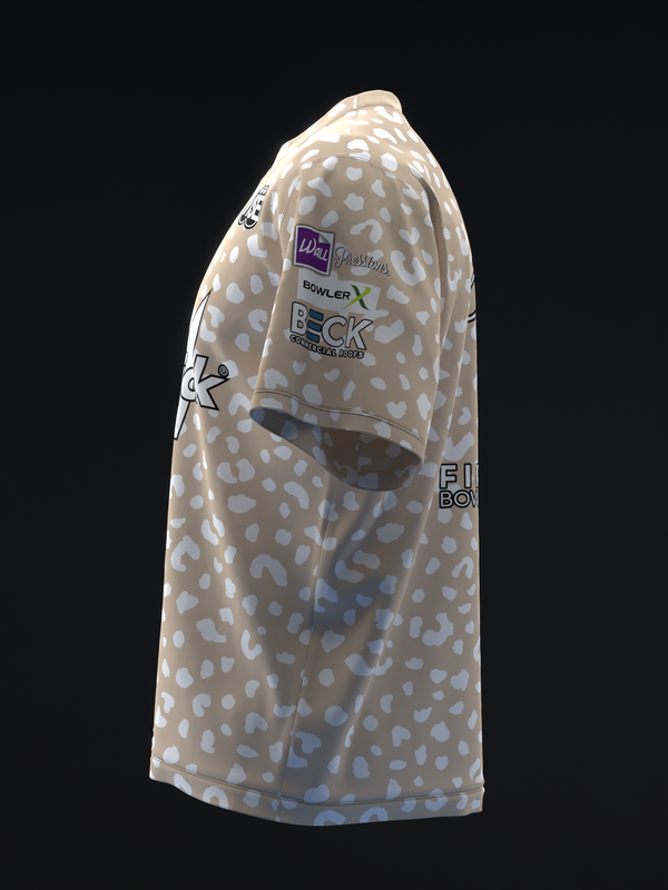 Tan bowling jersey with white leopard print pattern and brand logos, side view