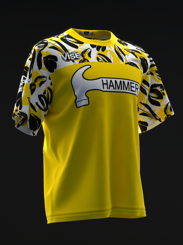 Yellow bowling jersey with hammer graphic and black floral pattern sleeves, front view