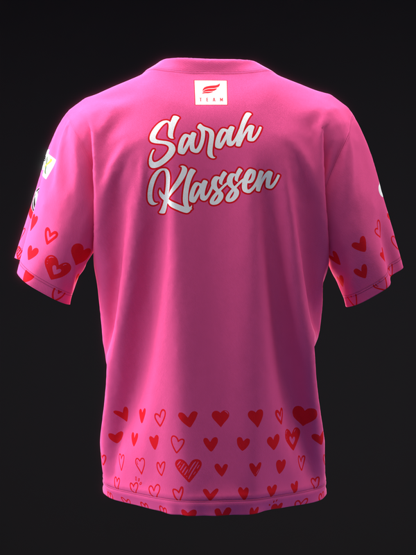 Pink bowling jersey with Sarah Klassen name and red heart pattern details back view
