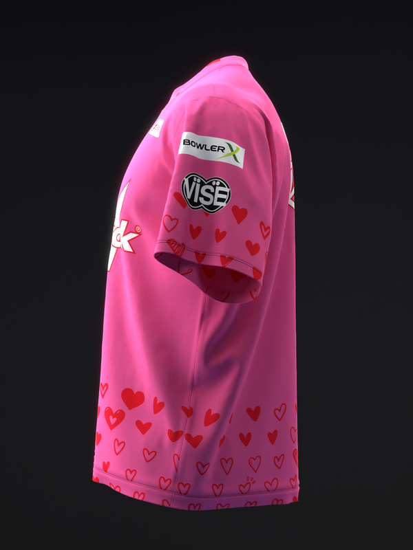 Bright pink bowling jersey with red heart pattern and Vise logo, side view