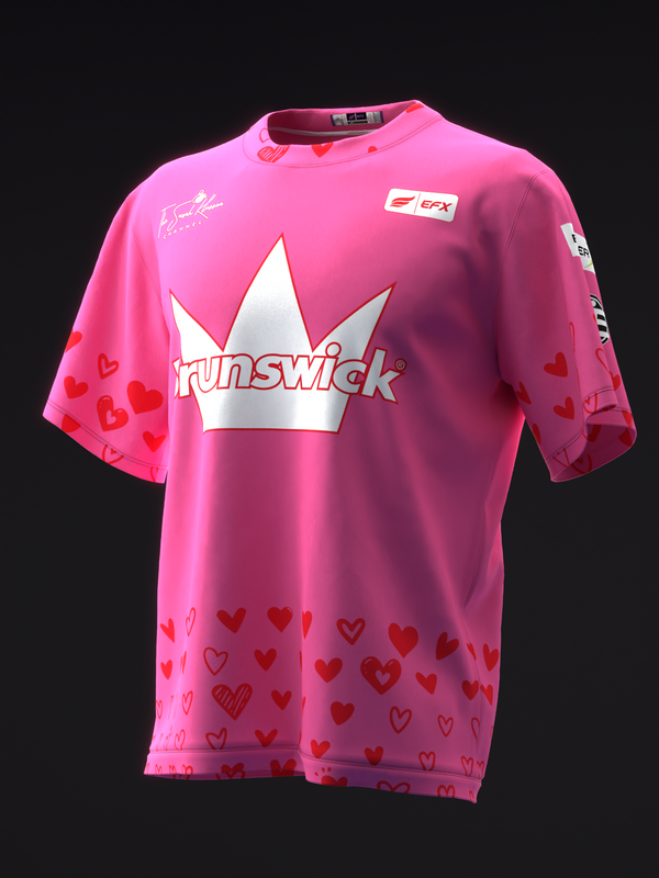 Pink bowling jersey with white crown logo, Brunswick text, and heart pattern details