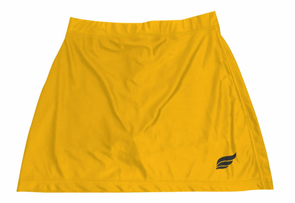 Gold bowling skort with small dark logo on lower right side