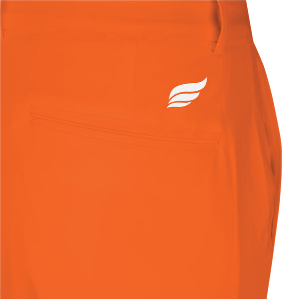 Bright orange bowling pants with small white wing logo on hip